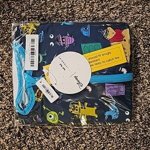 New In bag Little sleepies Monsters Inc 6-12 zippy
